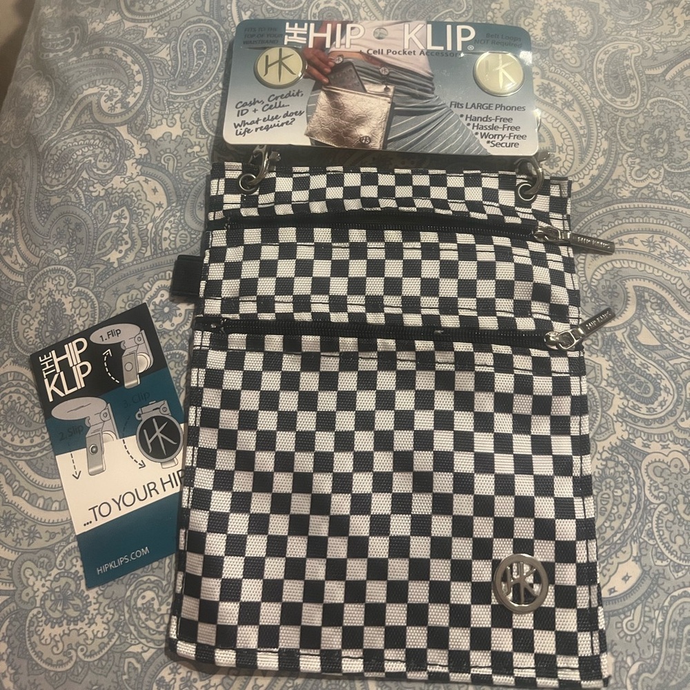 The Hip Klip Cell Pocket Accessory, holds cash/credit/ID and cell phone, new/pkg